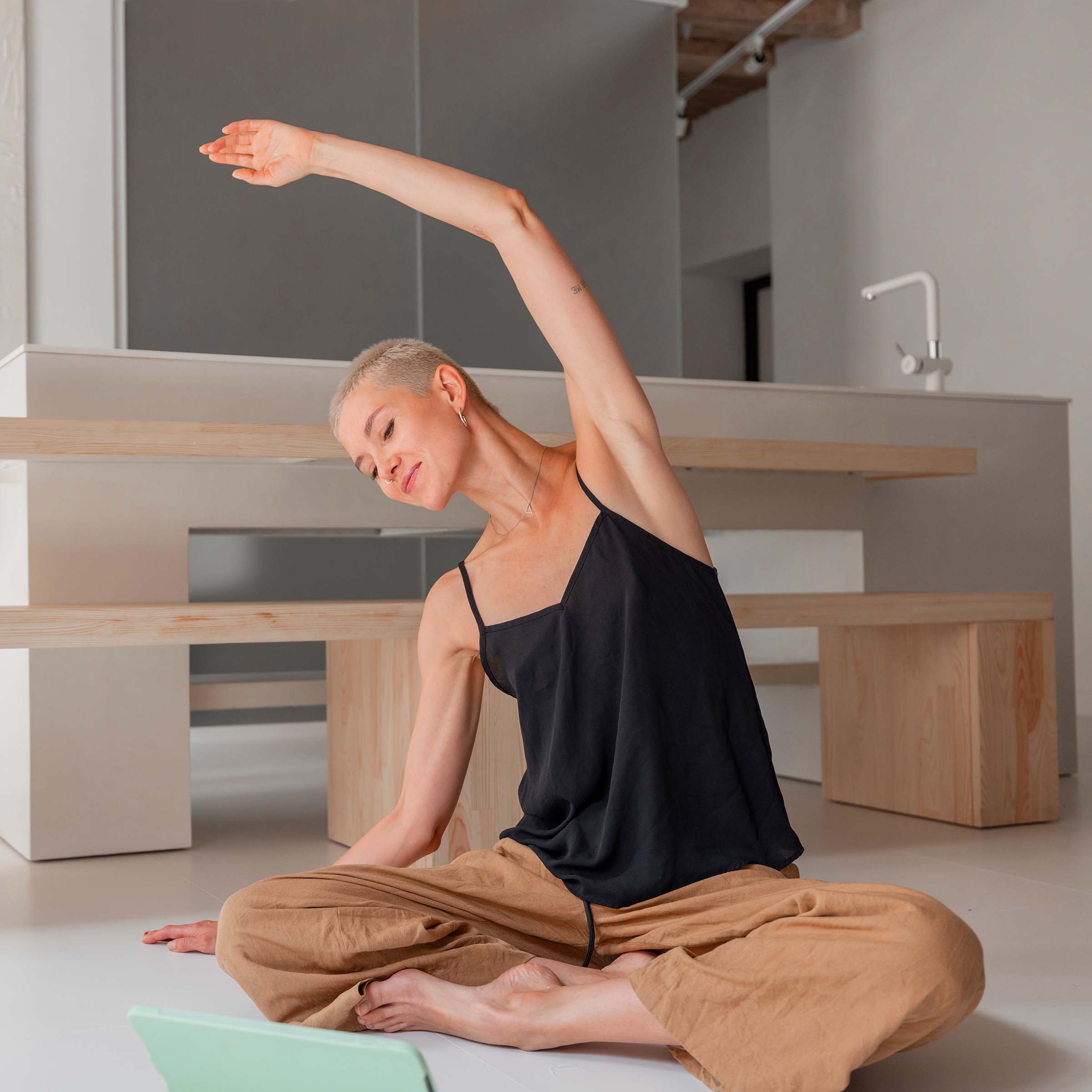 woman practising yoga at home 3LBGE59.jpg